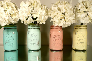 Jars flowers table mirror wall - a wall behind them free wallpaper
