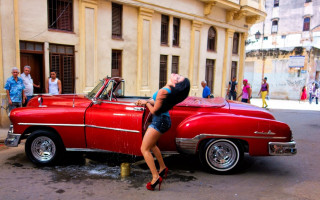 Woman leaning red car street - david lachapelle free wallpaper