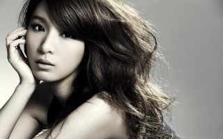 Woman long hair pose portrait - her cheek free wallpaper