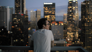 Man balcony city night skyscrapers 3 - skyscraper free wallpaper