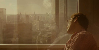 Man looking out window city 2 - david boyd free wallpaper