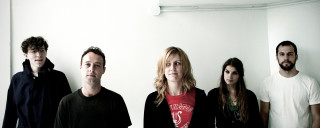 Group people standing room white - a silk screen free wallpaper