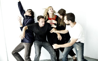 Group people standing room white 2 - a white wall free wallpaper