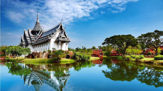 Large building tower lake trees - a tower free wallpaper
