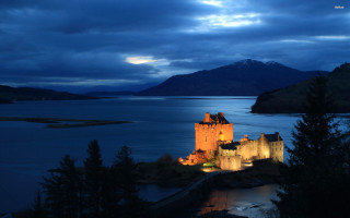Castle lit night lake mountains - the sky free wallpaper