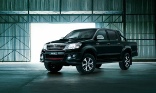 Black truck garage open door - a garage free wallpaper