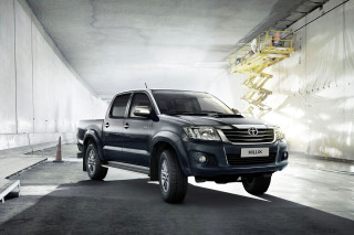 Black truck parking garage wall - a ladder free wallpaper