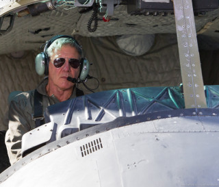 Man pilot seat headphones nosepiece - headphone free wallpaper