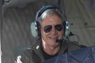 Man headphones sunglasses cockpit smile - imax 70 mm footage free wallpaper for desktop