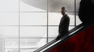 Man suit escalator airport terminal - a plane in the background free wallpaper