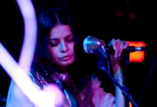 Woman holding microphone stand microphone - daphne allen free wallpaper