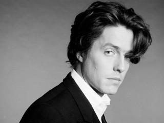 Man suit bow tie serious - his face and shoulders free wallpaper