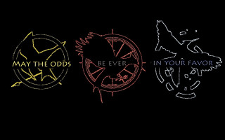 Three logos black background image - a compass free wallpaper