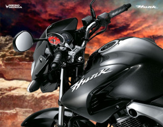 Black motorcycle mountain range red - sky in the background free wallpaper