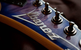 Guitar neck closeup jaguar name - a close up of a guitar neck free wallpaper