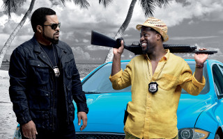 Man megaphone gun car beach - derold page free wallpaper