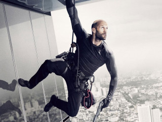 Man hanging high rise rope - daryush shokof free wallpaper