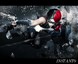 Woman red helmet gun aiming - cosplay free wallpaper