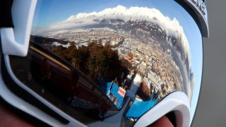 Person holding ski goggles city - free airplane wallpaper