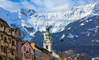 Clock tower town mountain background - a clock tower free wallpaper