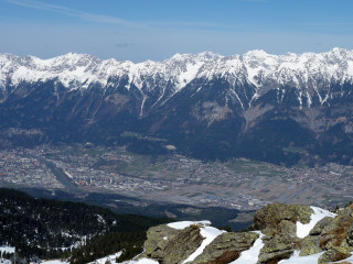 Man sitting mountain town snow - zenith view free wallpaper