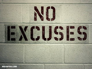 Brick wall no excuses sign - a brick wall free wallpaper