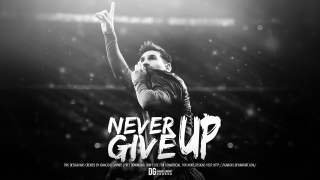 Man holding soccer ball never - a soccer ball free wallpaper