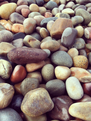 Pile of rocks red and - incoherent free wallpaper