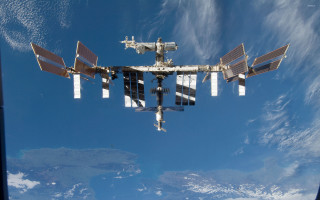Satellite flying blue sky clouds - a satellite satellite free wallpaper