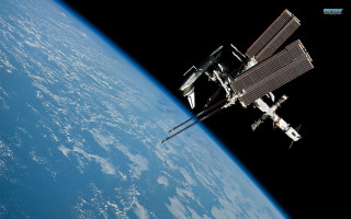 Space station earth view shuttles - a space station in the middle of the earth free wallpaper