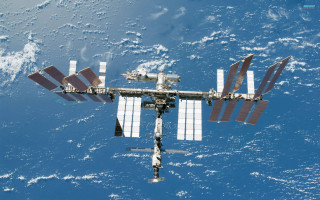 Space station ocean satellite attached - free space wallpaper