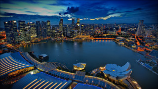 City skyline night water background - a large body of water free wallpaper