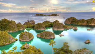 Boat islands trees ocean cloudy - a cloudy sky above free wallpaper