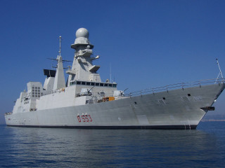 Large gray ship water shoreline - front view free wallpaper