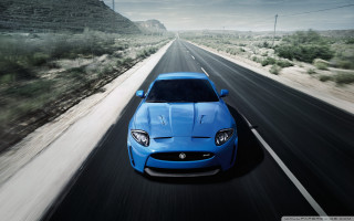 Blue sports car desert road 2 - a road in the desert free wallpaper