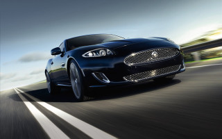 Black car driving road forest 6 - a black car free wallpaper