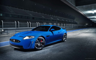 Blue sports car parking garage 5 - a parking garage free wallpaper