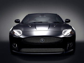 Black sports car studio spotlight - a spotlight free wallpaper