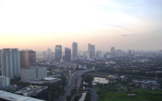 City skyline river bridge foreground 4 - basuki abdullah free wallpaper