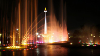 Fountain lights water night tower - a tower in the background free wallpaper