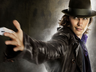 Man hat leather jacket holding - figurative free wallpaper