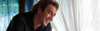 Smiling man laptop curtain background - chafik charobim free wallpaper