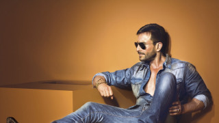 Man sitting ledge denim jacket - his leg free wallpaper