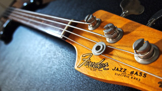 Bass guitar head neck black - a tilt shift photo free wallpaper