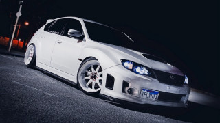 White car parked night road - andrew law free wallpaper