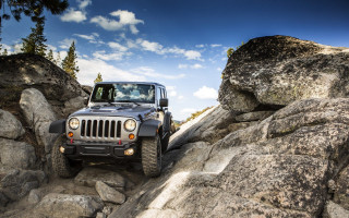 Jeep driving rocky trail woods - rock and boulders free wallpaper