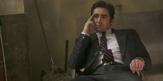 Man suit tie sitting phone - a pen free wallpaper