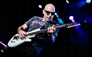 Man playing guitar stage microphone 3 - david lazar free wallpaper