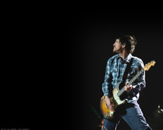 Man playing guitar concert microphone 2 - a concert free wallpaper
