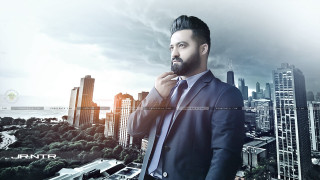 Man suit tie city skyline 2 - movie still frame free wallpaper
